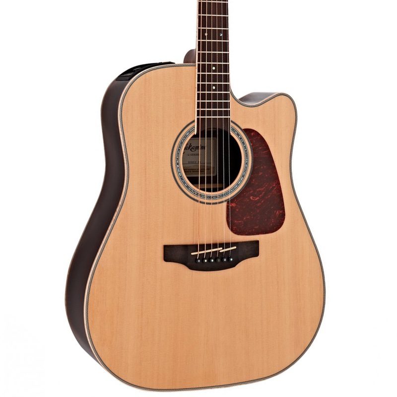 Body and soundhole of 6-string Takamine GN90CE-MD Electro Acoustic Guitar in Natural