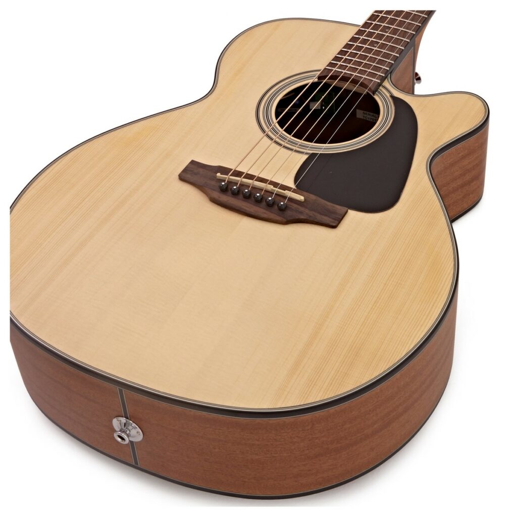 Close-up of body of Takamine GX18CE NEX Taka-Mini Electro Acoustic Travel Guitar in Natural