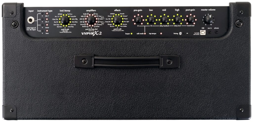 Top of black Peavey Vypyr X2 amp showing control knobs for volume, effects and amp setting